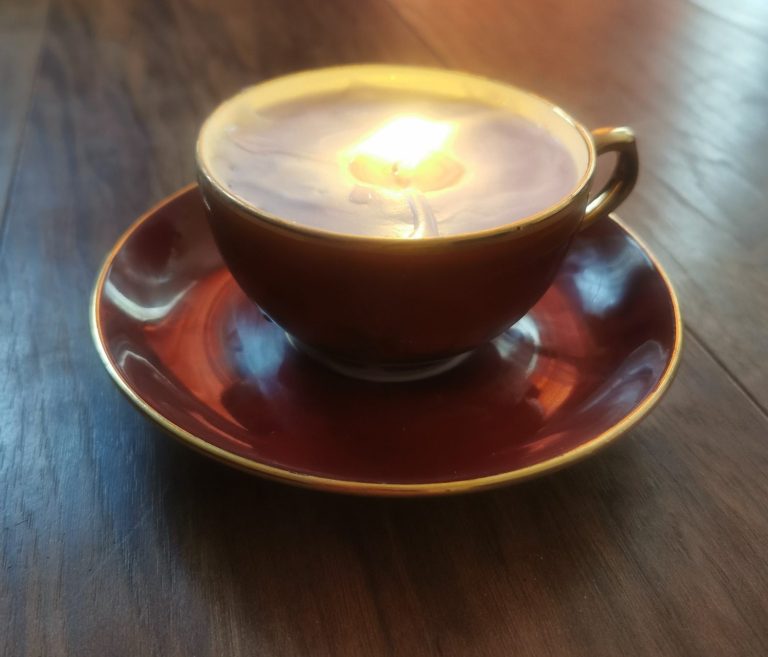 vintage-aromatherapy-tea-cup-candle-and-saucer Elegant tea cup and saucer setting for ambient home wellness from the Aromatherapy Collection at Bord Du Lac Artisans.