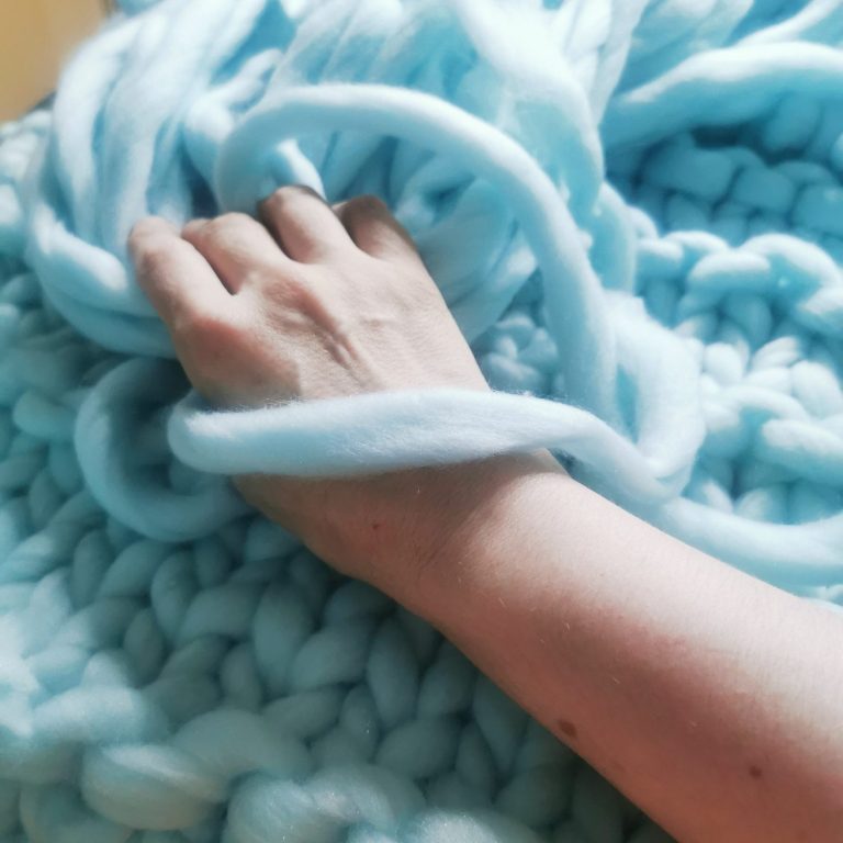 hand-knitted-wool-creation Unique thick wool hand-knitted blanket with a double strand pattern from the Adventures in Wool at Bord Du Lac Artisans.